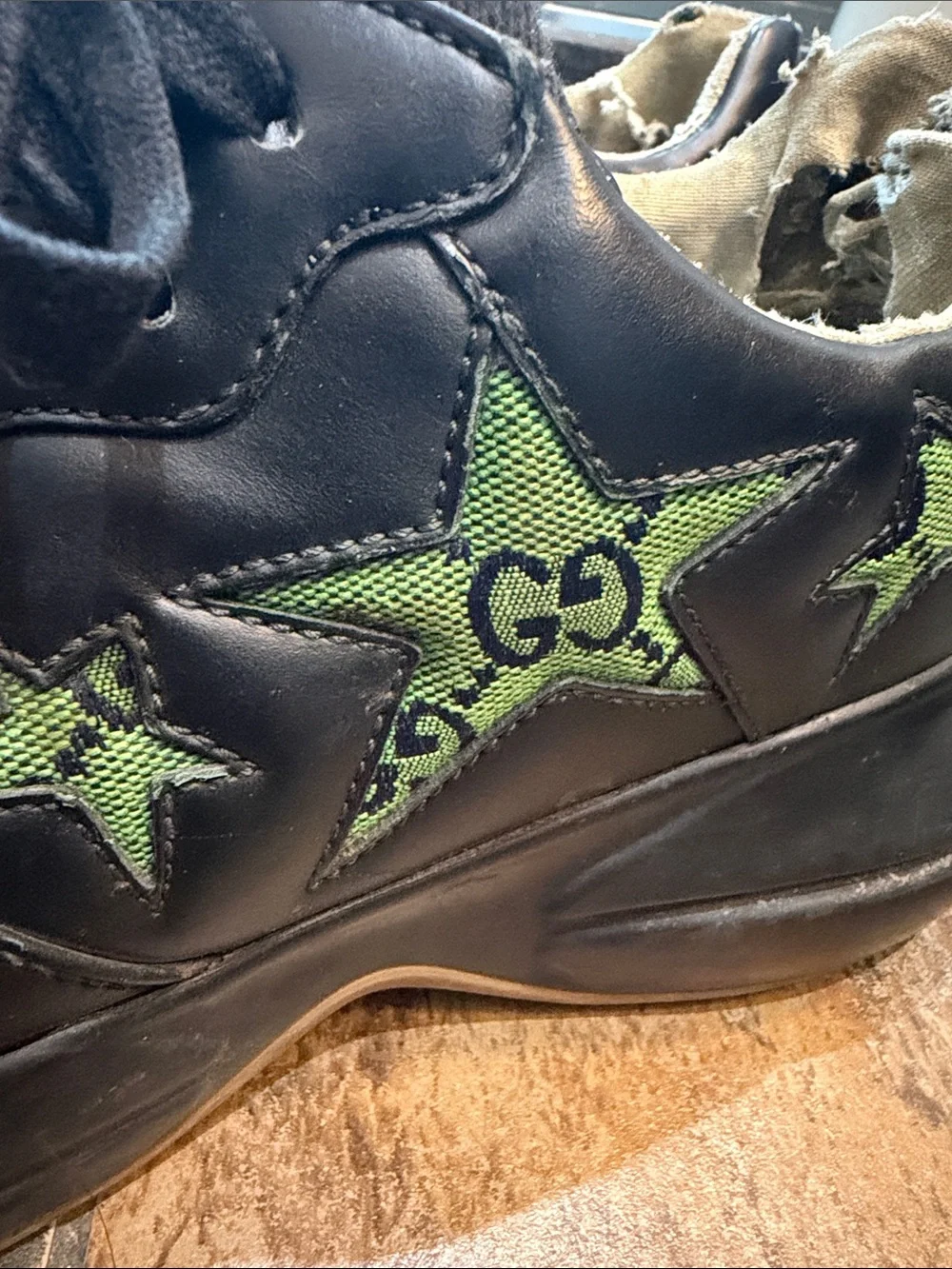 Black Leather Gucci Sneakers with Green Star Accents